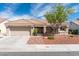 Charming single-story home with a well-manicured front yard and a spacious two-car garage at 8812 Marble Dr, Las Vegas, NV 89134