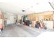 Spacious garage with ample storage cabinets, laundry area, and room for multiple vehicles and storage at 8812 Marble Dr, Las Vegas, NV 89134