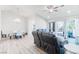 Open-concept living and dining area with neutral décor, lots of natural light, and modern finishes at 8812 Marble Dr, Las Vegas, NV 89134