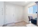 Bright room with a door, window, and a sitting area at 8812 Marble Dr, Las Vegas, NV 89134