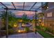 Inviting backyard featuring a stylish pergola, lush greenery, and a cozy seating area, great for entertaining at 8944 Campanella St, Las Vegas, NV 89123