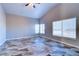 Bright bedroom with a vaulted ceiling, large windows and stylish tiled flooring at 8944 Campanella St, Las Vegas, NV 89123