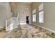 Bright living room features high ceilings, tile floors, and natural light streaming through multiple windows at 8944 Campanella St, Las Vegas, NV 89123