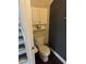 Cozy half bathroom with built-in white cabinets, offering a compact yet functional space at 898 Flagstone Way, Las Vegas, NV 89110
