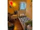 Bright bedroom decorated with dinosaur themed decor and plenty of natural light at 898 Flagstone Way, Las Vegas, NV 89110