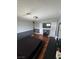 Spacious bedroom with hardwood floors, offering natural light and ample space for furniture at 898 Flagstone Way, Las Vegas, NV 89110