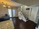 Entryway featuring stairs, dark wood flooring and a table with decorative accents at 898 Flagstone Way, Las Vegas, NV 89110