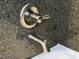 Close up of chrome bathtub faucet, with granite backdrop at 8985 S Durango Dr # 1010, Las Vegas, NV 89113