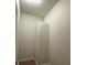 Walk-in closet with carpeted floor, featuring a storage system for organizing clothes and accessories at 8985 S Durango Dr # 1010, Las Vegas, NV 89113