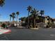 View of the Sunset Cliffs community gated entrance showcasing well-maintained landscaping at 8985 S Durango Dr # 1010, Las Vegas, NV 89113
