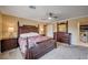 Bedroom featuring a bed, with side tables, lamps, and a dresser with a mirror at 902 Dianne Dr, Boulder City, NV 89005
