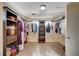 Spacious walk-in closet with custom shelving and ample storage space for clothes and accessories at 902 Dianne Dr, Boulder City, NV 89005