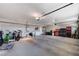 A spacious garage featuring overhead storage and lots of open floor space at 902 Dianne Dr, Boulder City, NV 89005