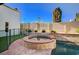 Backyard hot tub and pool with artificial grass, perfect for outdoor relaxation at 902 Dianne Dr, Boulder City, NV 89005
