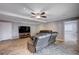 Spacious living room with a ceiling fan and comfortable leather seating at 902 Dianne Dr, Boulder City, NV 89005