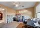 A home office with a large window, desk, chair, and plenty of storage space at 902 Dianne Dr, Boulder City, NV 89005