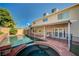 Backyard swimming pool and attached spa with covered patio area; great for entertaining outdoors at 902 Dianne Dr, Boulder City, NV 89005