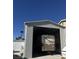 Exterior view of the RV garage, showcasing ample space for storing a large motorhome at 902 Dianne Dr, Boulder City, NV 89005