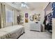 Cozy bedroom with carpet floors, ceiling fan and a dresser at 9066 Hilverson Ave, Las Vegas, NV 89148
