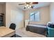 This bedroom features a neutral palette, a built-in closet, and great natural light at 9066 Hilverson Ave, Las Vegas, NV 89148