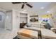 Spacious living room featuring a sectional sofa and open access to dining area at 9066 Hilverson Ave, Las Vegas, NV 89148