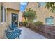 Cozy patio area with stylish seating, tiled flooring, and greenery at 9066 Hilverson Ave, Las Vegas, NV 89148