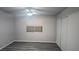 Serene bedroom highlighting window, closet, and wood-look flooring at 928 Rockview Dr # 102, Las Vegas, NV 89128