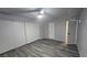 Inviting bedroom with wood-look floors and closet with sliding doors at 928 Rockview Dr # 102, Las Vegas, NV 89128