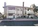 Condominium featuring a classic exterior and private entrance at 928 Rockview Dr # 102, Las Vegas, NV 89128