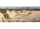 Desert landscape with walking path, trees and mountains in the background at 928 Rockview Dr # 102, Las Vegas, NV 89128