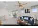 Upstairs loft with plenty of natural light, a sofa, and barstool seating at 9671 S Conquistador St # Lot 18, Las Vegas, NV 89178