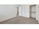 Comfortable bedroom featuring neutral walls, soft carpeting, a closet, and bright natural light at , Las Vegas, NV 89144