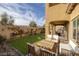 Outdoor patio with ample seating, perfect for outdoor dining and relaxation at 11913 Alava Ave, Las Vegas, NV 89138