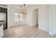 Adjacent dining space with views of kitchen offering stainless appliances and an island at 11913 Alava Ave, Las Vegas, NV 89138