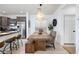 Charming dining area featuring a rustic wooden table and a stylish pendant light at 11913 Alava Ave, Las Vegas, NV 89138
