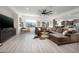 Open-concept living room seamlessly connected to the kitchen, creating a harmonious living space at 11913 Alava Ave, Las Vegas, NV 89138