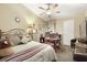 Cozy bedroom features a ceiling fan, a comfortable bed, and natural light at 2725 S Nellis Blvd # 2083, Las Vegas, NV 89121