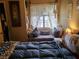 Bedroom features a cozy window seat, soft lighting, and inviting decor at 2725 S Nellis Blvd # 2083, Las Vegas, NV 89121