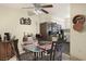 Charming dining area adjacent to the kitchen features an oval glass table at 2725 S Nellis Blvd # 2083, Las Vegas, NV 89121