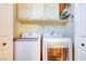 Bright laundry room with white washer and dryer, plus storage at 2725 S Nellis Blvd # 2083, Las Vegas, NV 89121