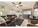 Cozy living room featuring a fireplace, comfortable seating, and plenty of natural light at 2725 S Nellis Blvd # 2083, Las Vegas, NV 89121