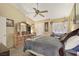 Cozy bedroom featuring carpet, ceiling fan and large dresser with mirrored doors at 2725 S Nellis Blvd # 2083, Las Vegas, NV 89121