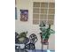 Charming patio with outdoor seating, welcome sign, and a view to the front at 2725 S Nellis Blvd # 2083, Las Vegas, NV 89121