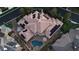 Stunning aerial view of a home featuring solar panels, a backyard pool, and manicured landscaping at 3008 Astoria Pines Cir, Las Vegas, NV 89107