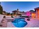 Serene backyard with pool, landscaped patio, creating a private outdoor oasis at 3008 Astoria Pines Cir, Las Vegas, NV 89107