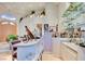 Elegant home bar area featuring custom shelving, sink, and wine display, perfect for entertaining guests at 3008 Astoria Pines Cir, Las Vegas, NV 89107