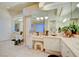 Bathroom with double vanity and large mirror at 3008 Astoria Pines Cir, Las Vegas, NV 89107