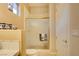 Neat bathroom featuring a toilet, shower with glass door and coordinated towel set at 3008 Astoria Pines Cir, Las Vegas, NV 89107