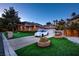 Beautiful exterior with a well-maintained lawn, a white car, and an attached two-car garage at 3008 Astoria Pines Cir, Las Vegas, NV 89107
