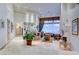Grand living room with tall ceilings, large windows, and elegant furnishings, perfect for entertaining at 3008 Astoria Pines Cir, Las Vegas, NV 89107